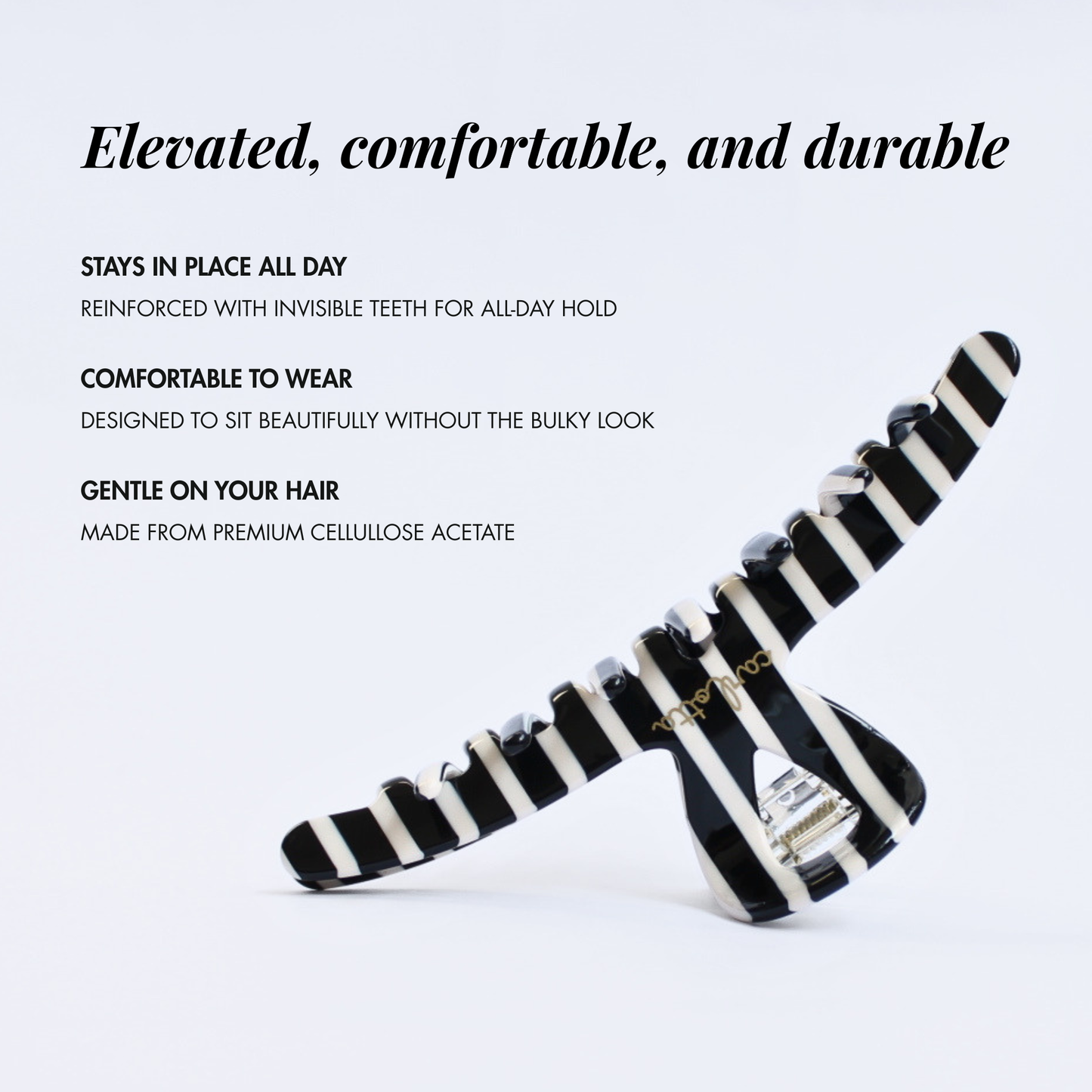 Inner strength large hair claw clip black and white stripes