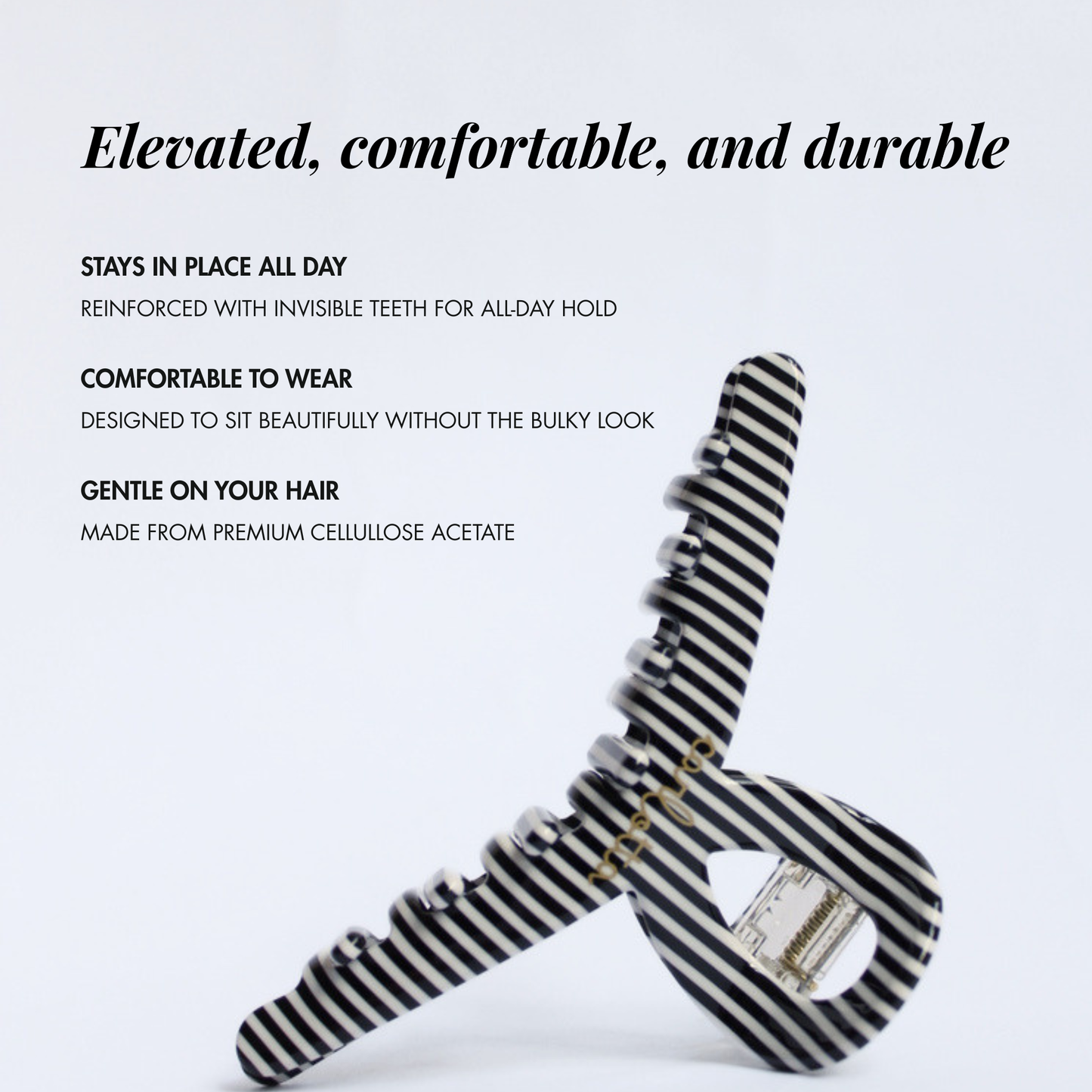 Inner strength medium hair claw clip black and white stripes
