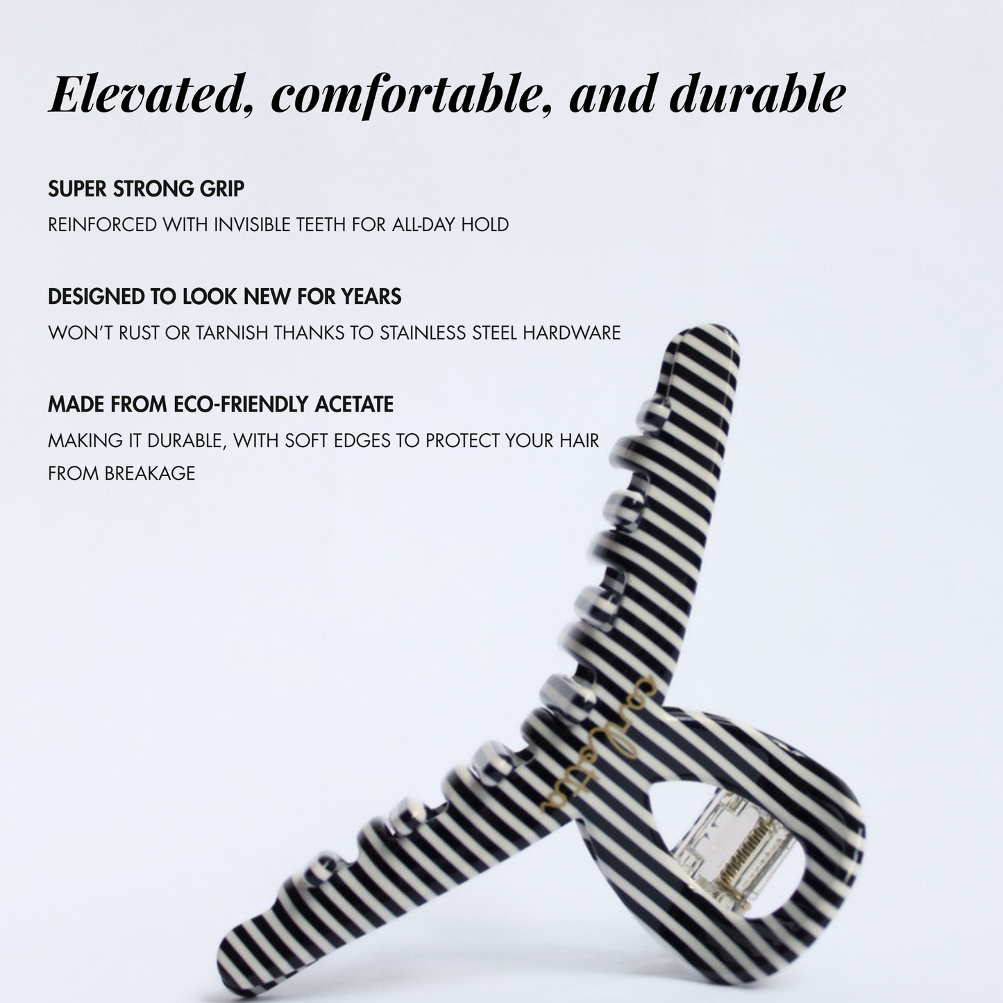 Inner strength medium hair claw clip black and white stripes