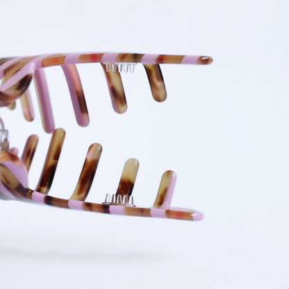 Inner strength medium hair claw clip tortoiseshell and pink stripes