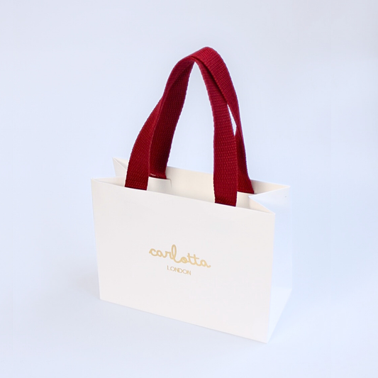 Carlotta gift bag - gold logo